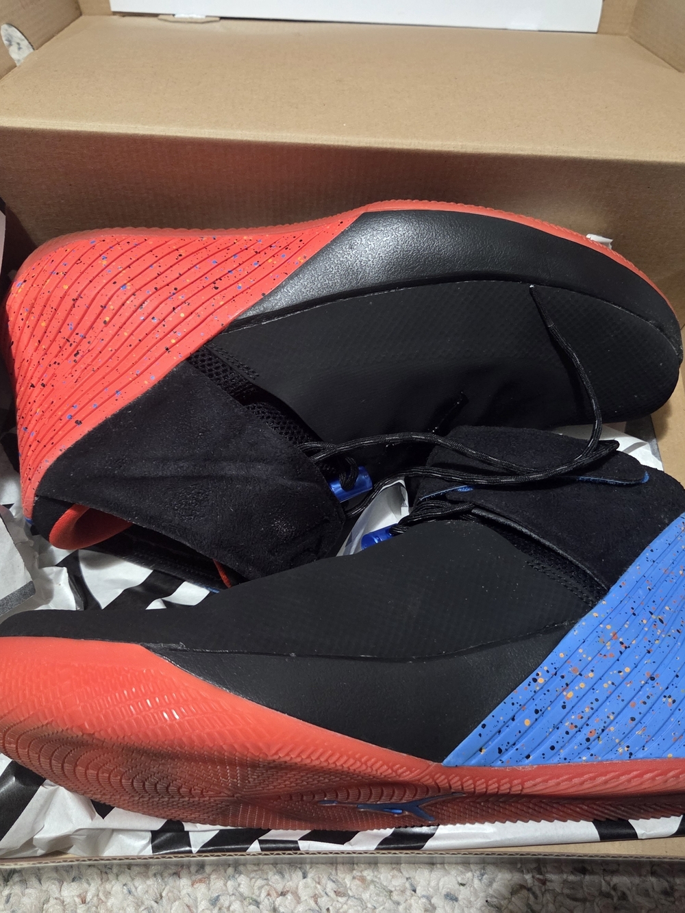 Jordan Why Not Zero.4 Black with Signal Blue Accents